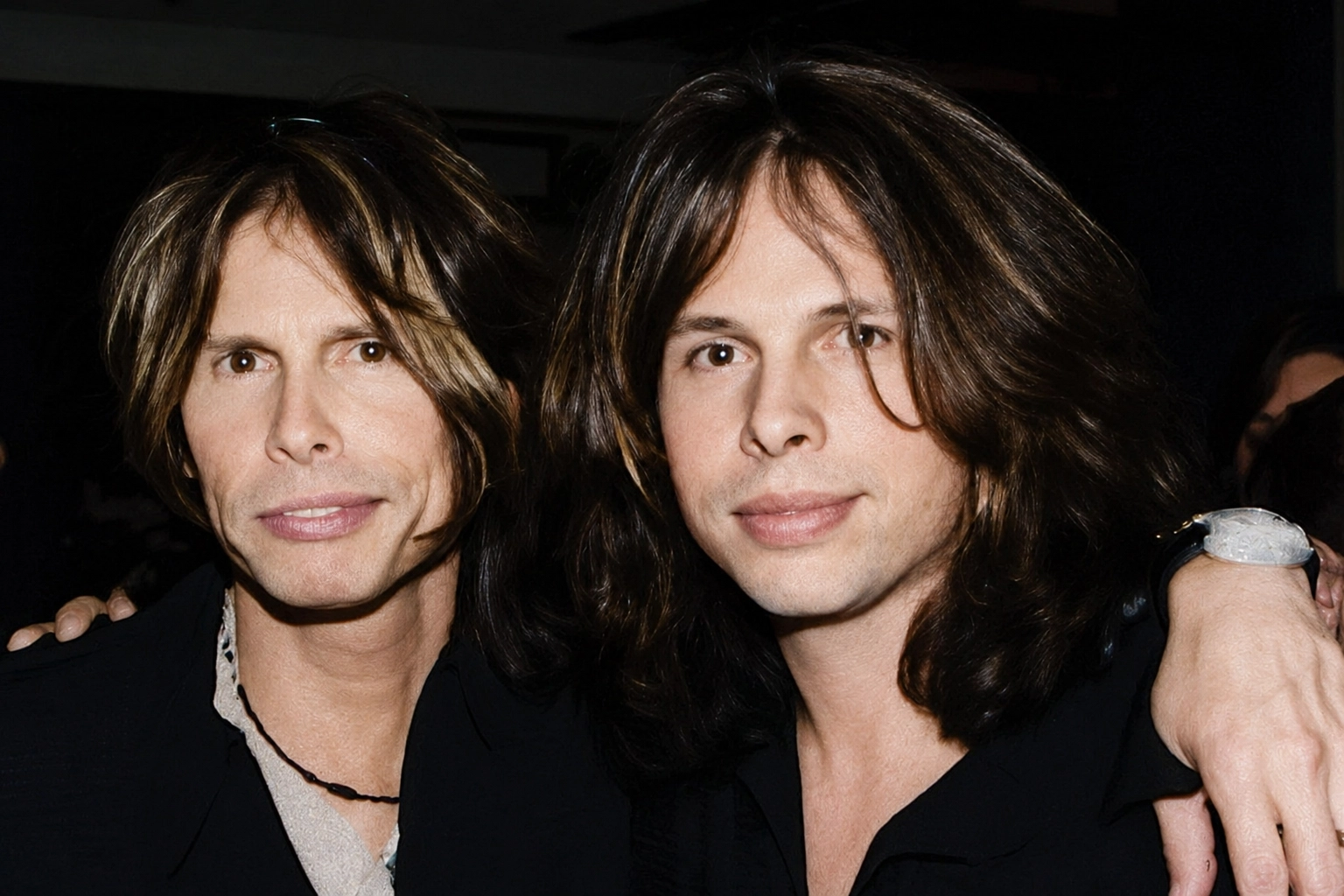 Neill Byrnes with Steven Tyler in 2004.